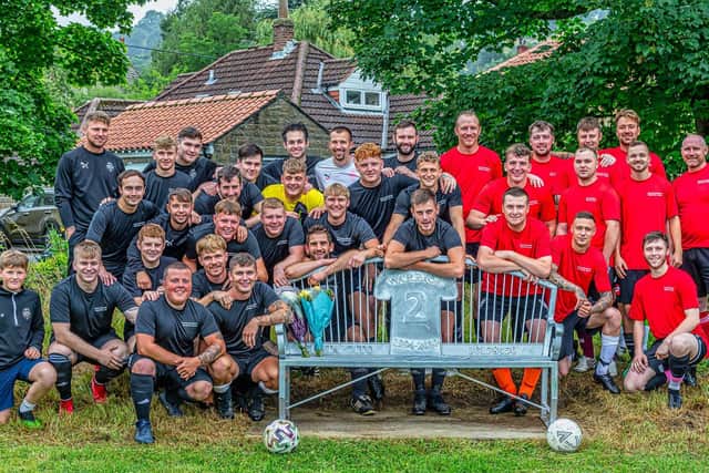 The teams line up by the Chris Warrior Memorial bench
Photos by Brian Murfield