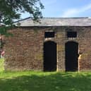 The tiny red-brick lock-up nicknamed the black hole