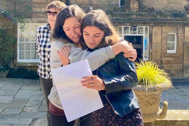 Kyra celebrates her A-level results with her mum.