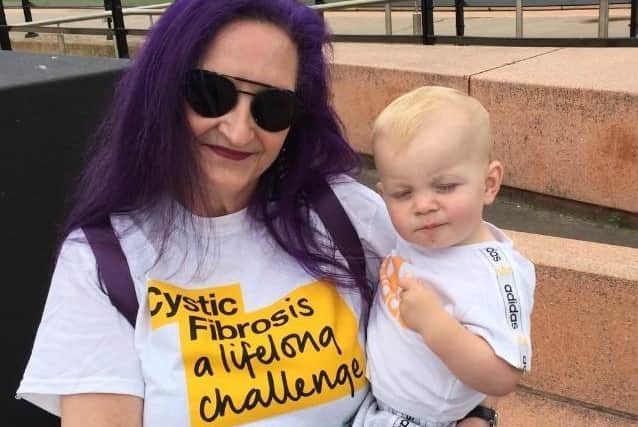 Trish Robinson is pictured with her grandson Logan.