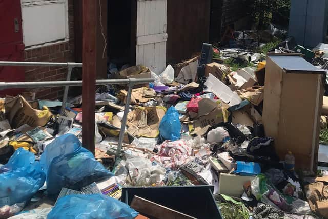 The rubbish in the garden at the South Back Lane bungalow has now been cleared away by contractors