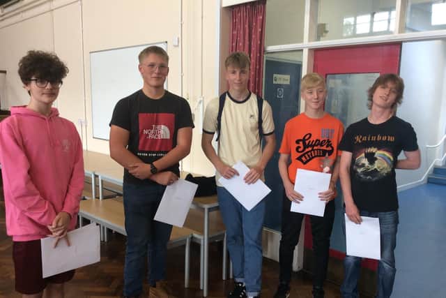 Students with their GCSE results.