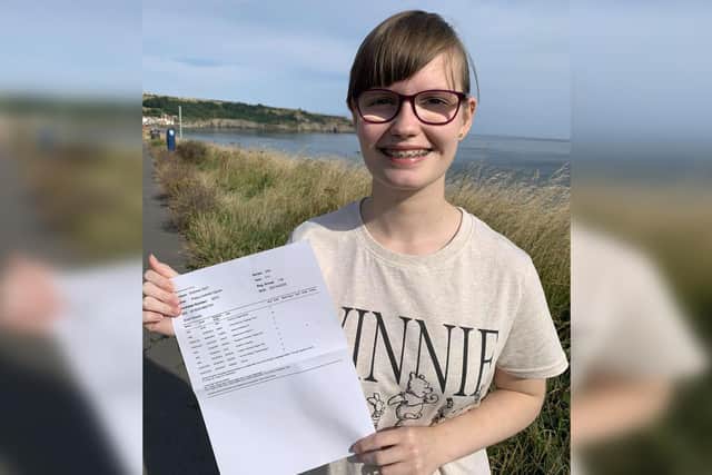 Poppy Ogram celebrating her results