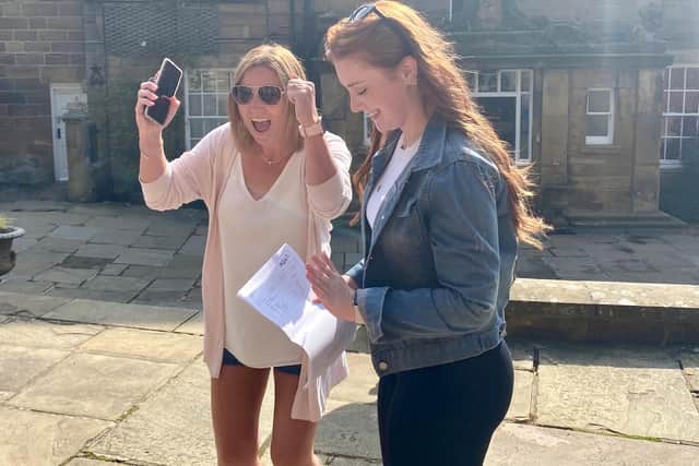 Fyling Hall School student Emie-May and her mum Kelly celebrate her high grades.
