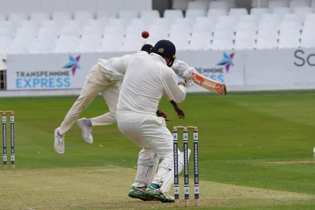 Romario Roach bowls a bouncer for Scarborough CC
Photo by Simon Dobson