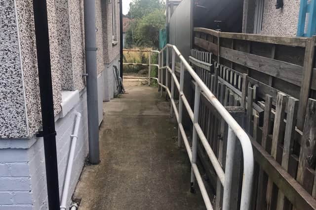 The rubbish in the garden at the South Back Lane bungalow has now been cleared away by contractors