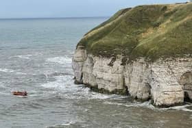 The crew veered the lifeboat down into the entrance of the cave and safely took the three people on board, two of whom had suffered injuries.