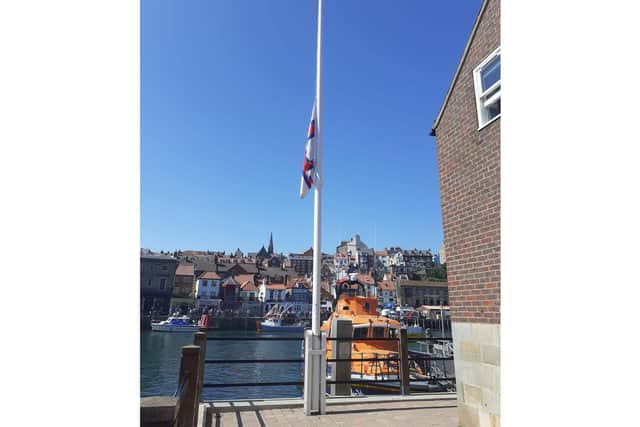 The flag at Whitby RNLI station flying at half mast. (Whitby RNLI)
