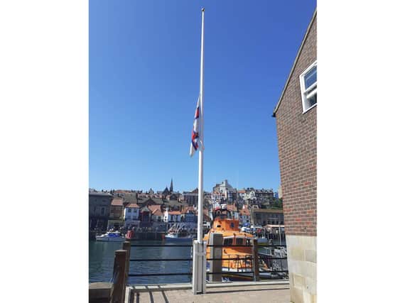 The flag at Whitby RNLI station flying at half mast. (Whitby RNLI)
