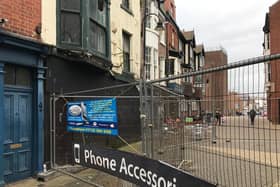 The hoarding blocking part of North Street. (JPI Media)