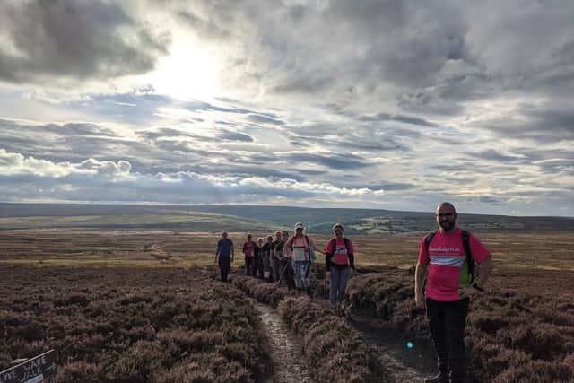 The group of walkers venturing across the moors. (Photo: Harriet Allen)