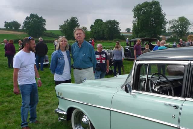 Sarah Crabtree from the Classic Car TV Show “Bangers and Cash” joins Sir Greg Knight to inspect a 1957 Chevrolet Bel Air at the event.  Sarah Crabtree from the Classic Car TV Show “Bangers and Cash” joins Sir Greg Knight to inspect a 1957 Chevrolet Bel Air at the event.