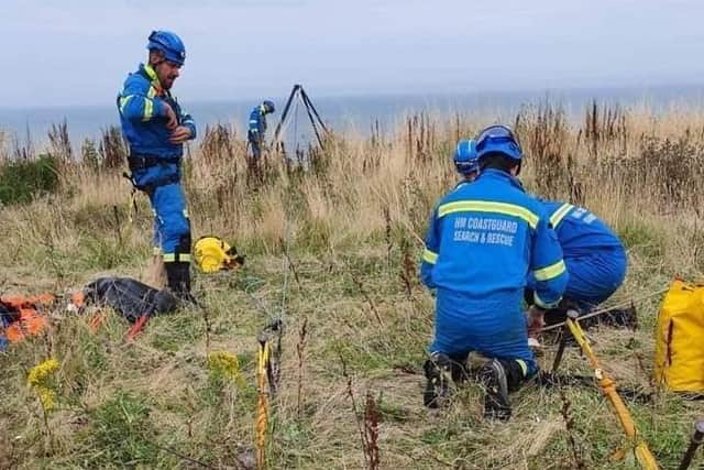 The coastguard teams carried out a cliff rescue using newly qualified specialist technicians and brought all four and their dog to safety.