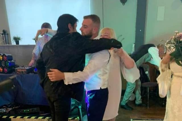 Ian Deakin (left) during the emotional meeting with groom Dale Clegg.