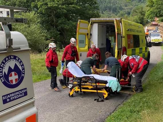 The mountain rescue team assisting the ambulance crew. (Scarborough and Ryedale Mountain Rescue Team)