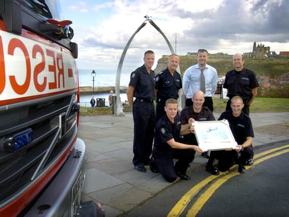 Firefighters charity walk raises £852 for the Great North Air Ambulance.