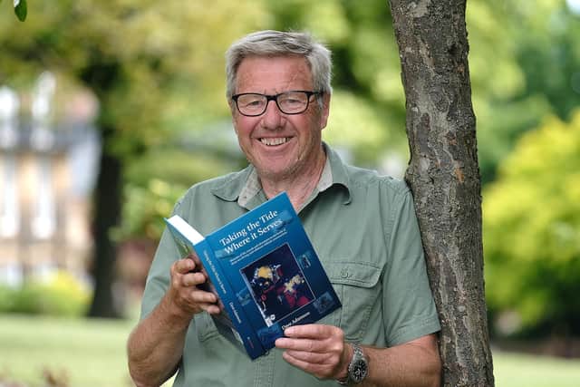 David Adamson is pictured with his book Taking The Tide Where It Serves.