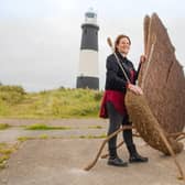 Emma Stothard with the beautiful Green Hairstreak butterfly sculpture. Photo: Richard Walker/PA Wire