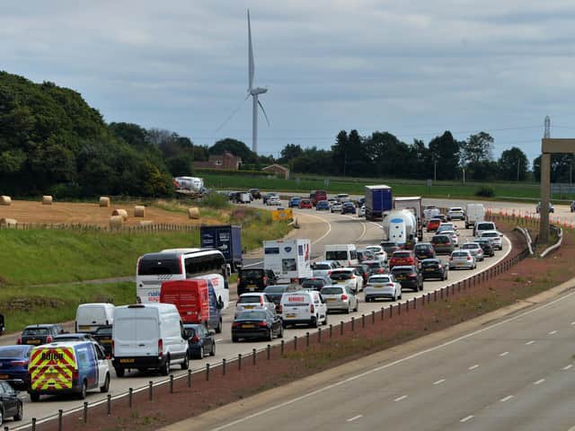 Traffic chaos on the A1(M) as festival-goers arrive for Leeds Festival.