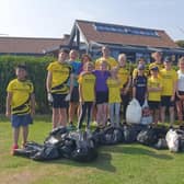 Accompanied by a number of parents and coach Josh Taylor, several of the club’s young runners spent an afternoon cleaning up parts of the South Beach in Bridlington. Photo submitted