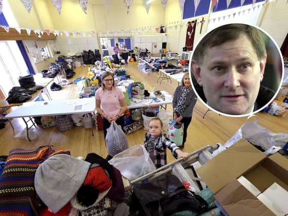 Donations for Afghan refugees at Scarborough's Rainbow Centre. Inset, former York MP Hugh Bayley.