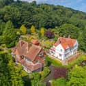 An aerieal view showing the house that is currently for sale, and its surroundings.