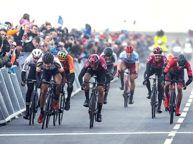 Alexander Kamp, Riwal Readynez, wins the sprint in North Bay on Marine Drive from Chris Lawless, Team Ineos, in 2019.