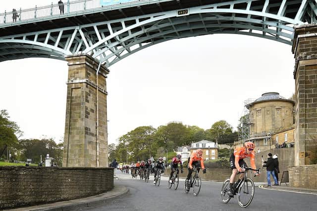 The Tour de Yorkshire heads past the Rotunda on South Bay as they head to the finish.
