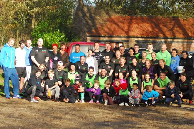 Blast fitness members are pictured before their Burpee Mile to raise money for Help the Heroes and Yorkshire Cancer Research in 2013. Do you recognise any of the people in the photograph? (nbfp-dt1343-4a)