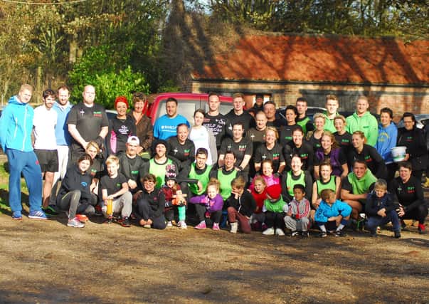 Blast fitness members are pictured before their Burpee Mile to raise money for  Help the Heroes and Yorkshire Cancer Research in 2013. Do you recognise any of the people in the photograph? (nbfp-dt1343-4a)