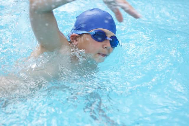Swimming stock image. (Shutterstock)