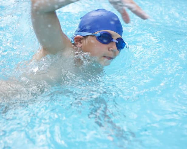 Swimming stock image. (Shutterstock)