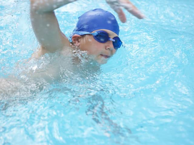 Swimming stock image. (Shutterstock)