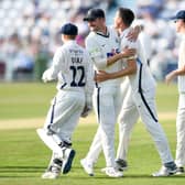 Yorkshire's Matt Fisher celebrates the wicket of Somerset's Azhar Ali with team-mate Jordan Thompson Picture by Will Palmer/SWpix.com