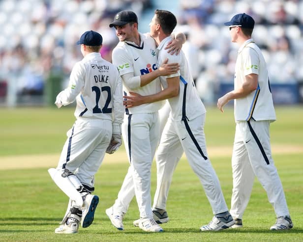 Yorkshire's Matt Fisher celebrates the wicket of Somerset's Azhar Ali with team-mate Jordan Thompson Picture by Will Palmer/SWpix.com