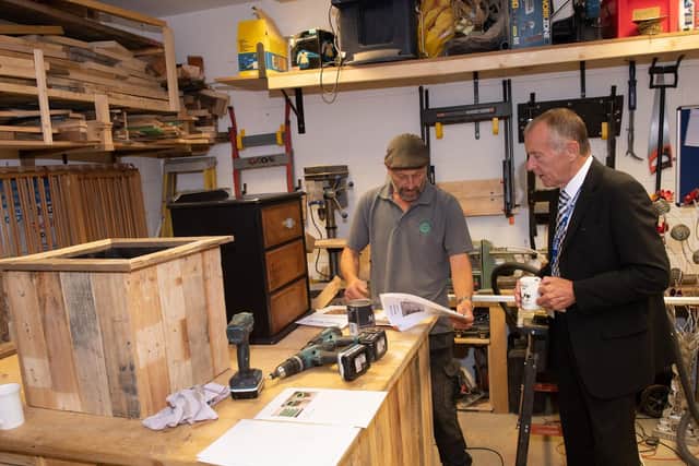 Darren Thompson from The Recycle Project and County Councillor Derek Bastiman in the York workshop