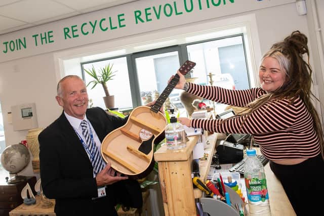 County Councillor Derek Bastiman and Annie Goodwin from The Recycle Project in the new shop in York