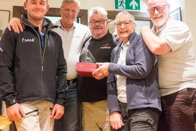 Leeds Arms Nicholson Trophy winners Jan and Martin Stallard (second and fourth from right)

PHOTO BY CHRIS CLARK