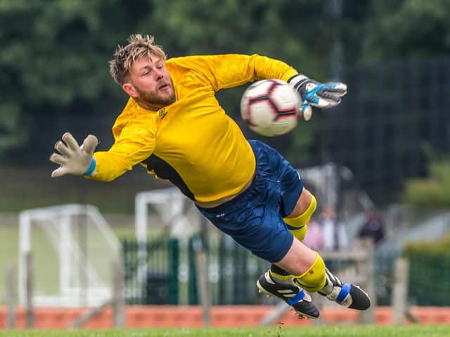 Davey Welham makes a flying stop to Whitby Fishermen
Photo by Brian Murfield