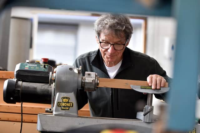 Charles Airlie working in the shed.