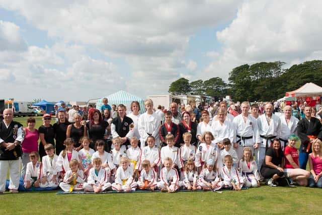 Members of the Bridlington Martial Arts and Fitness Centre pose for the Free Press photographer at the Sewerby Gala in 2013. Do you recognise any of the people in the picture? (msh1330x699)