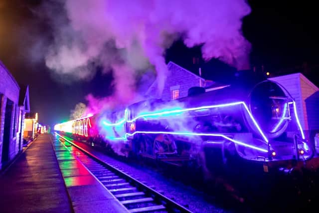 Illuminated train on the North Yorkshire Moors Railway.