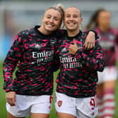 Beth Mead (right) and Leah Williamson of Arsenal warm up before theChampions League match against Slavia Prague