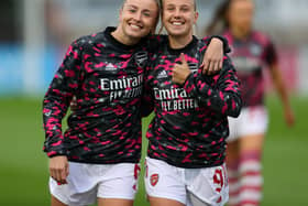 Beth Mead (right) and Leah Williamson of Arsenal warm up before theChampions League match against Slavia Prague