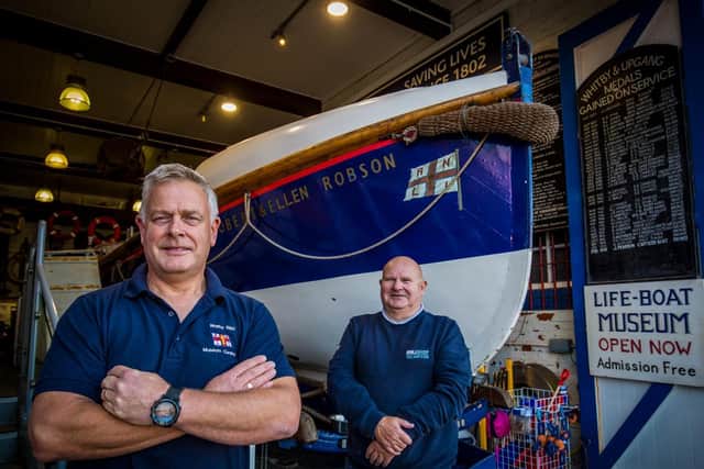 Whitby lifeboat museum curator Neil Williamson with shop manager Barrie Lazenby outside the museum where Robert & Ellen Robson is currently housed.