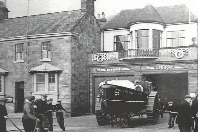 Historic image of the 'Robert & Ellen Robson' lifeboat being pulled out in 1953.
