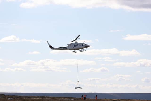 Materials lifted on to the Bilsdale site by helicopter.