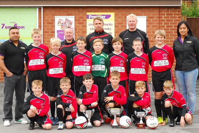 Burlington Jackdaws Under 11s football team is pictured in new kit sponsored by Gavin and Jaz Aujla of Sewerby News. Do you recognise any of the footballers in the photograph? (nbfp-dt1344-1a)