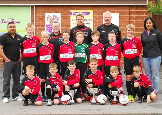 Burlington Jackdaws Under 11s football team is pictured in new kit sponsored by Gavin and Jaz Aujla of Sewerby News. Do you recognise any of the footballers in the photograph? (nbfp-dt1344-1a)