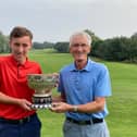 Josh Beecroft and grandad, Boro legend Harry Dunn with the silverware